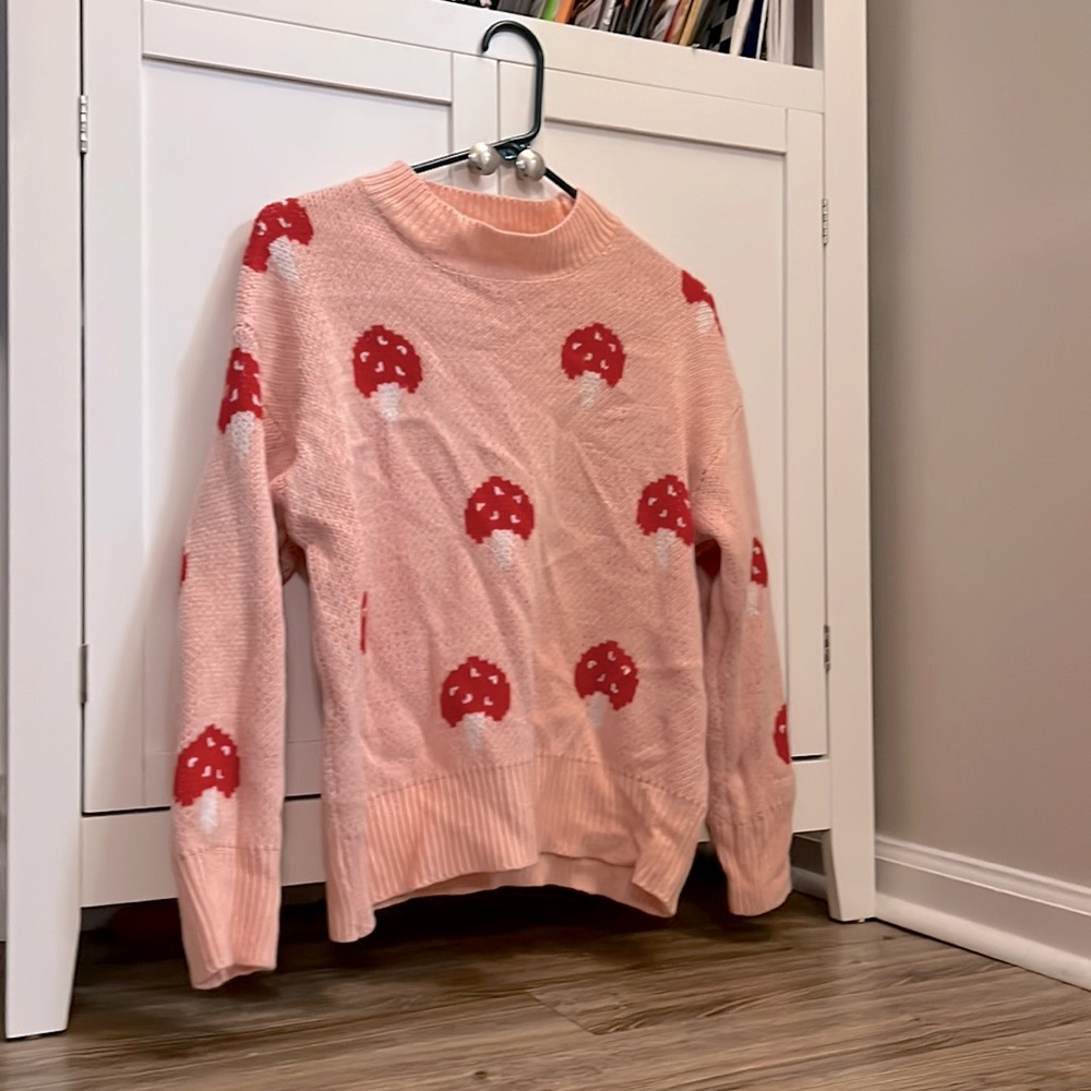 never worn pink strawberry sweater